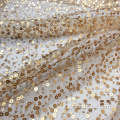 Pizzo ricamato con paillettes metallizzato oro